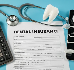 Dental insurance forms on a desk 