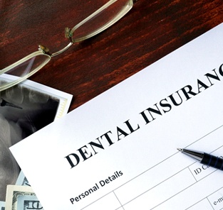 dental insurance form on table