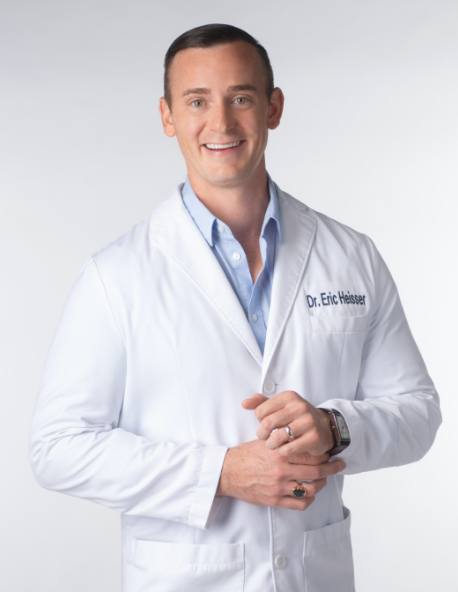 Doctor Heisser wearing a lab coat
