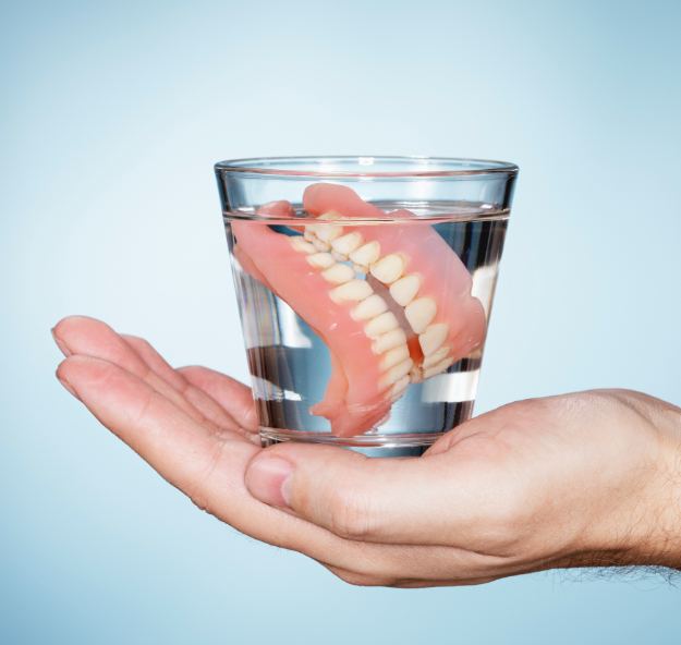 Dentures in a glass of water