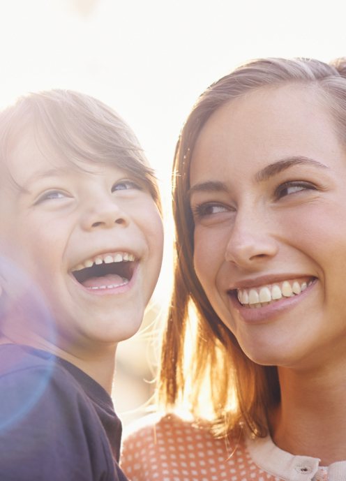 Mother and child smiling after preventive dentistry visit