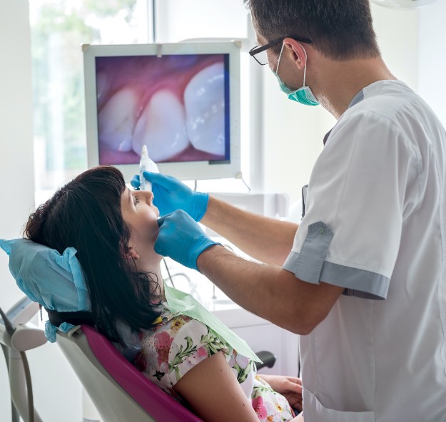 Dentist capturing intraoral images