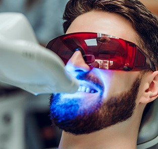 Man having teeth whitened in-office